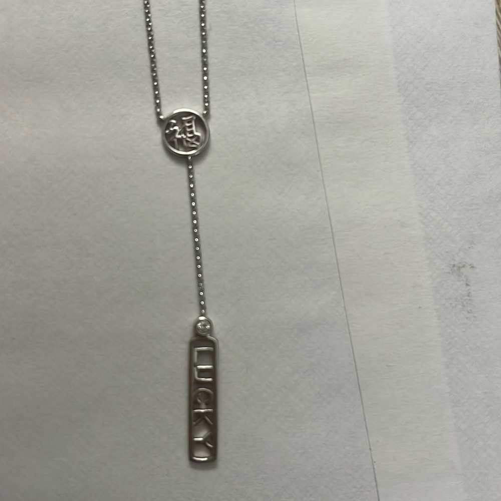 Lucky necklace with Chinese symbol and diamond